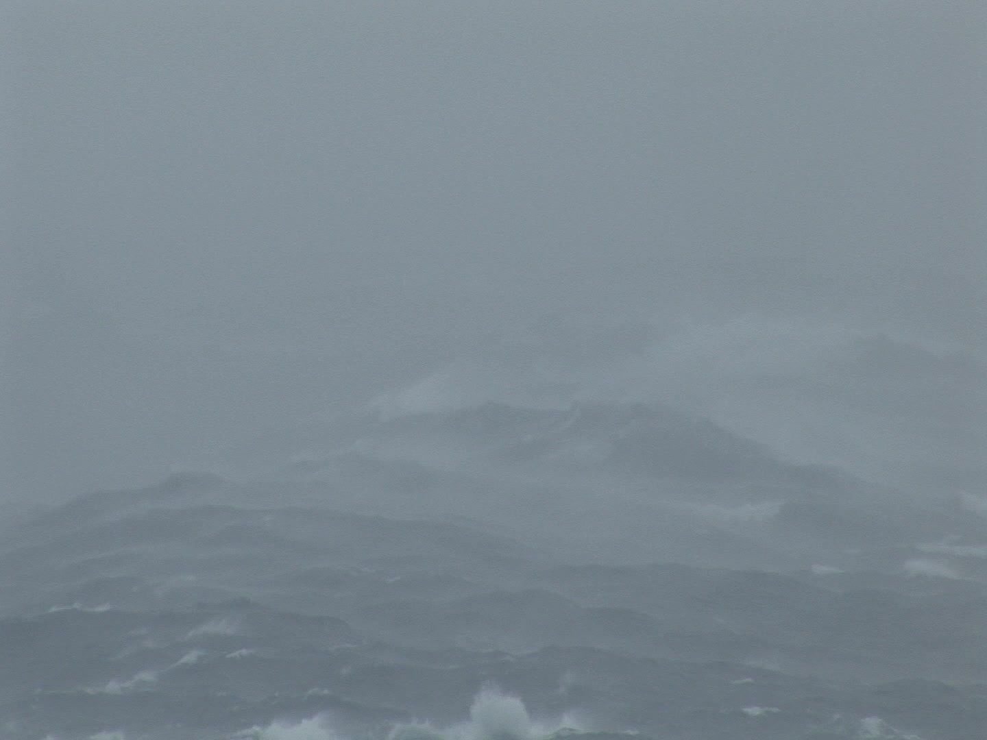 Big waves rolling during hurricane, ocean POV, close-up