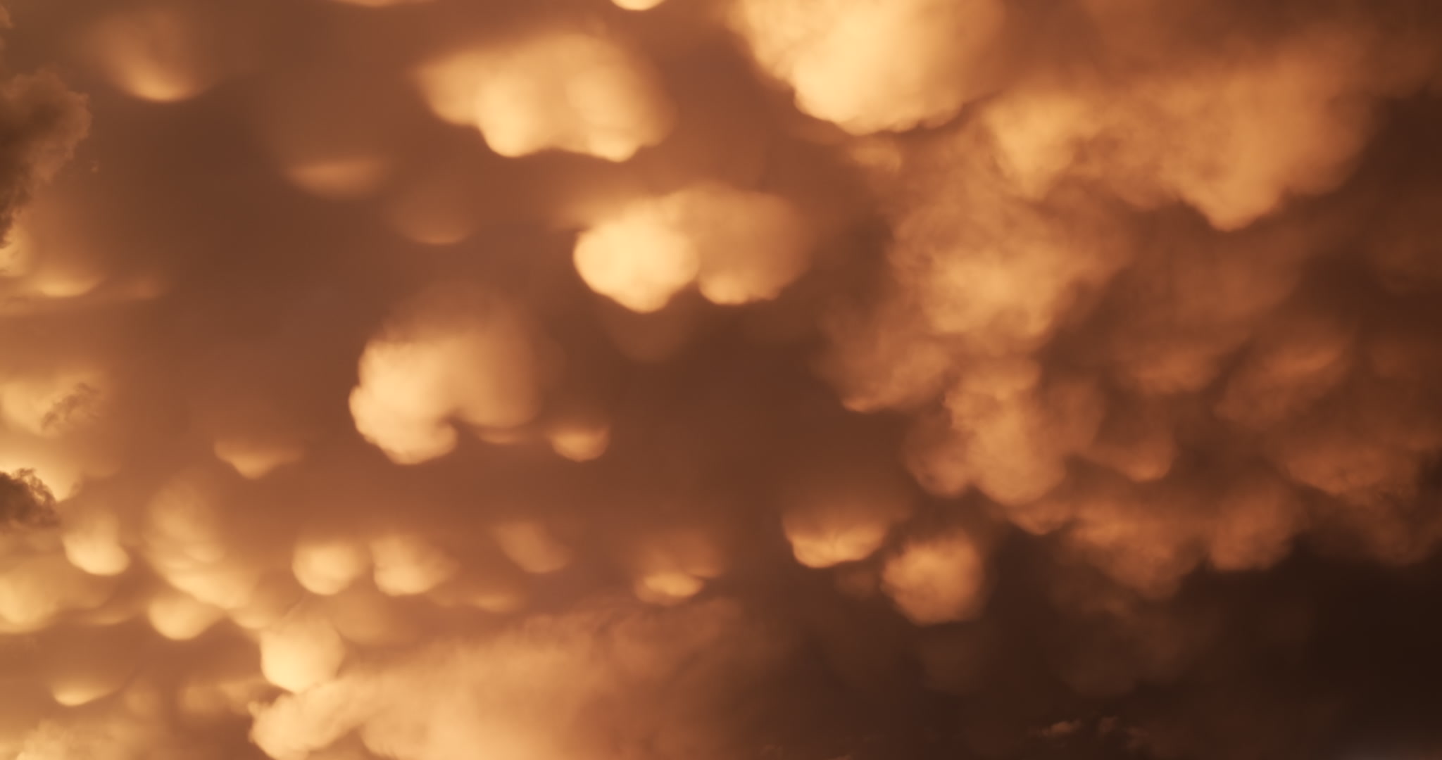 Storm Clouds - Amazing, gorgeous orange mammatus clouds lit by setting sun, Waco, Texas, 4K