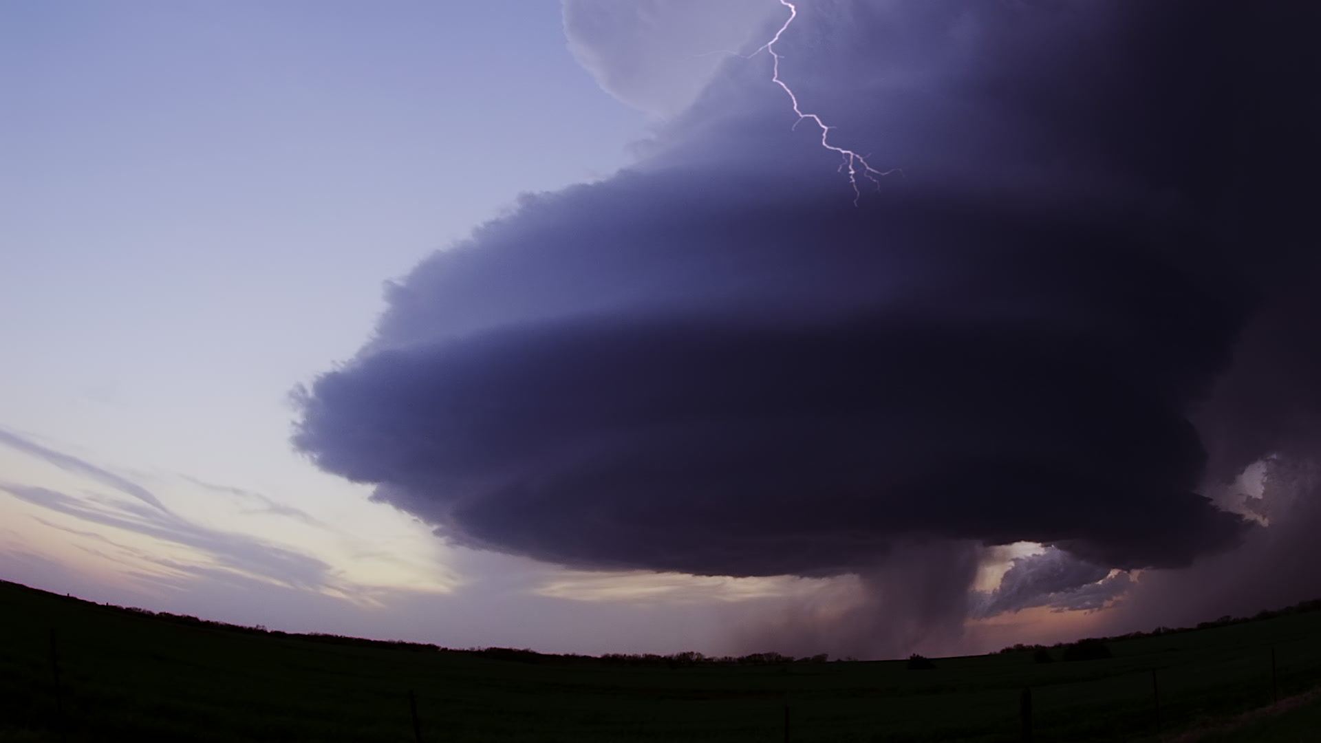 Storms on 35 - Flying saucer supercell with lightning, dusk, Windthorst, Texas