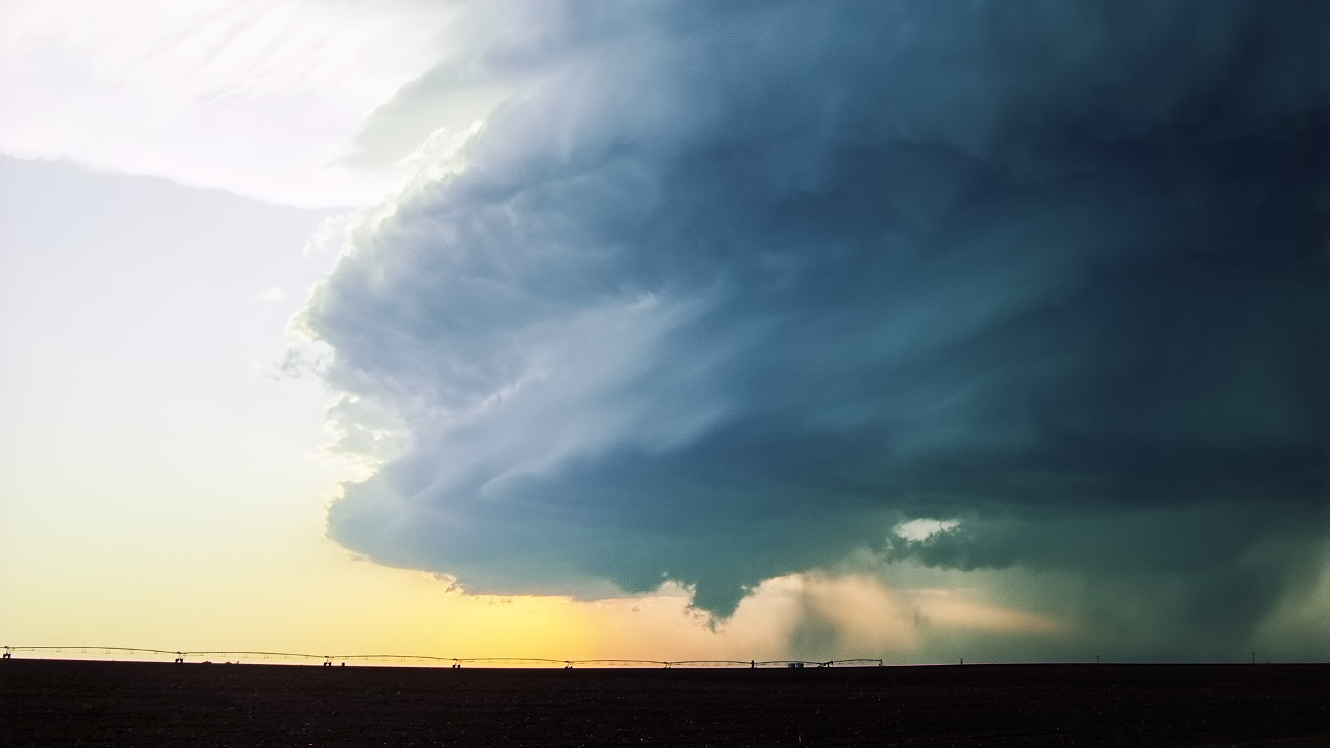 Storms on 35 - Mothership supercell thunderstorm approaches, sunset, lightning, Texas
