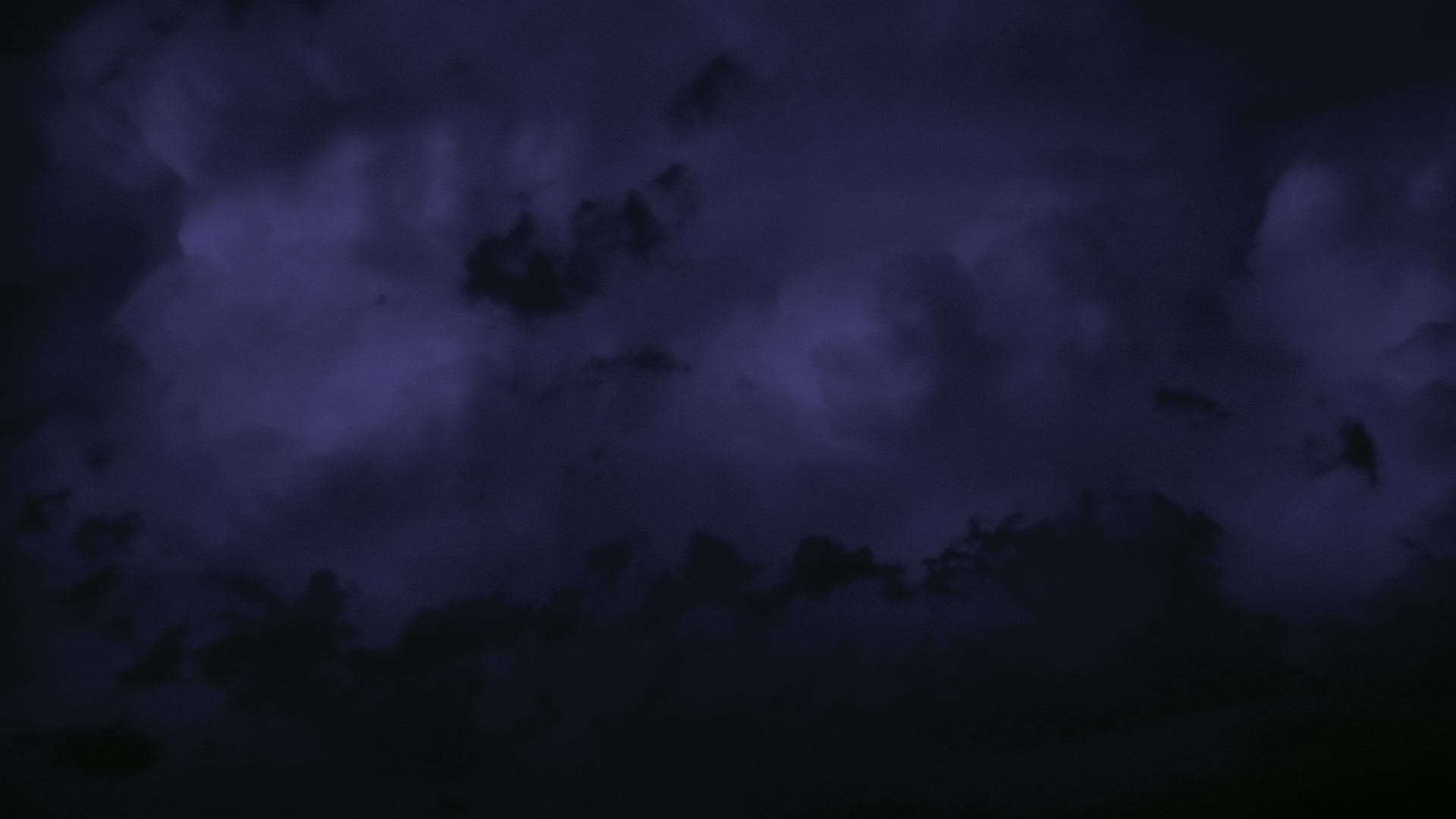 Storms on 35 - Lightning flashes inside blue thunderstorm, dusk, El Reno