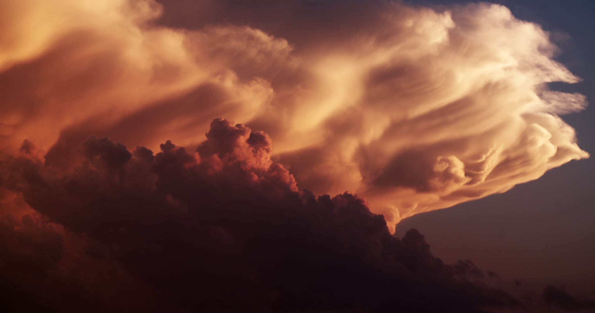 Storm clouds - Fiery orange thunderstorm at sunset, 4K