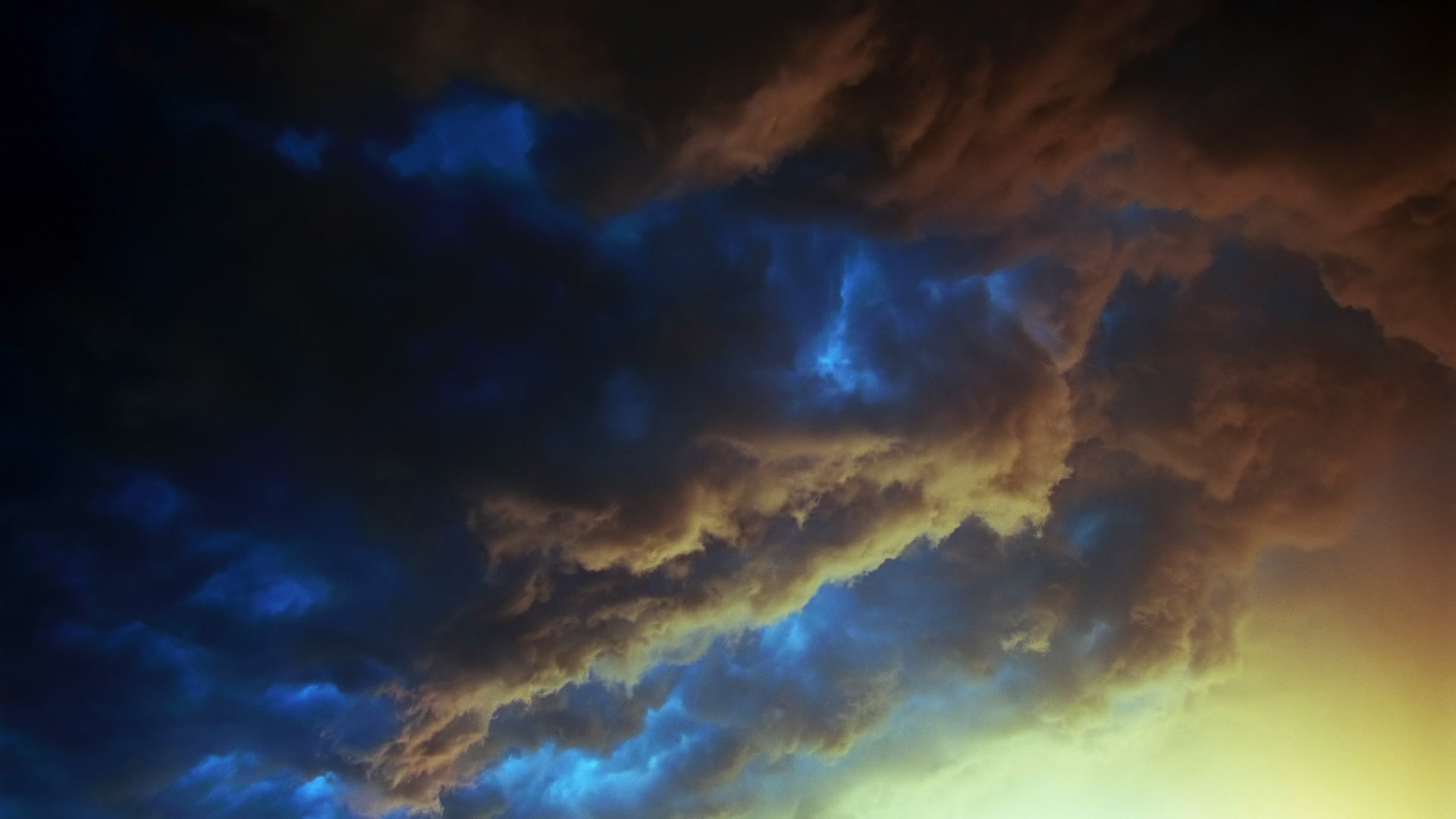 Storms on 35 - Beautiful inky teal and orange storm clouds swirl, Texas