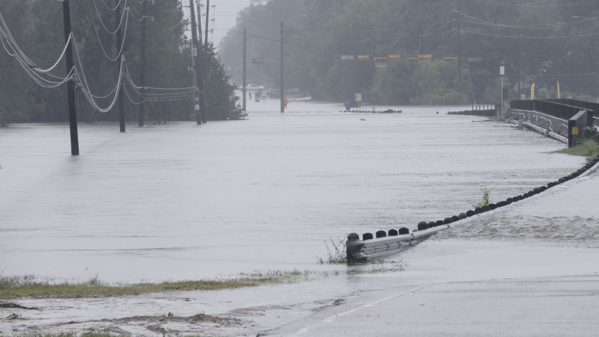 Hurricane Harvey - Flooded creek and bridge, 4K