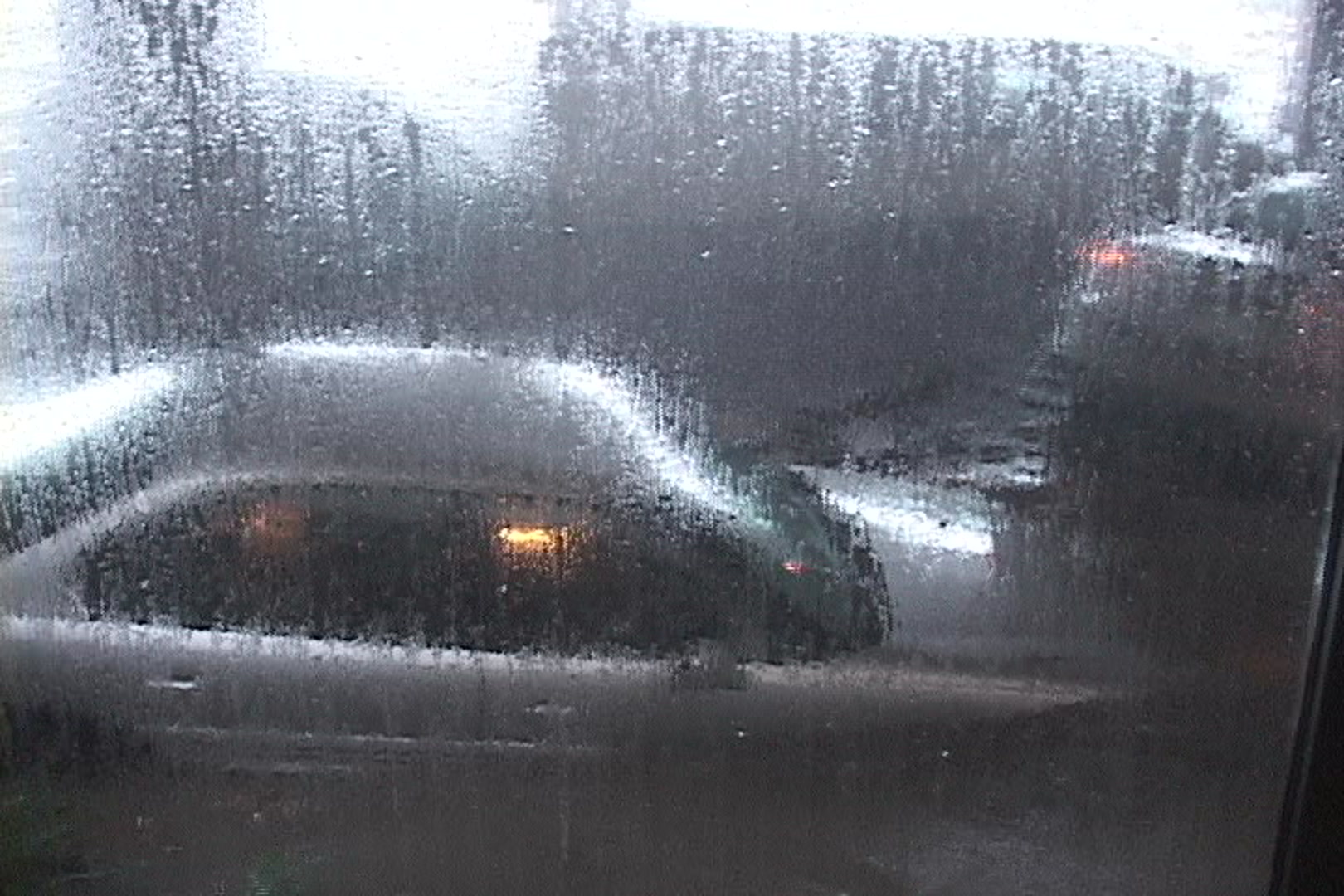 Dramatic shot of car floating by, Hurricane Katrina