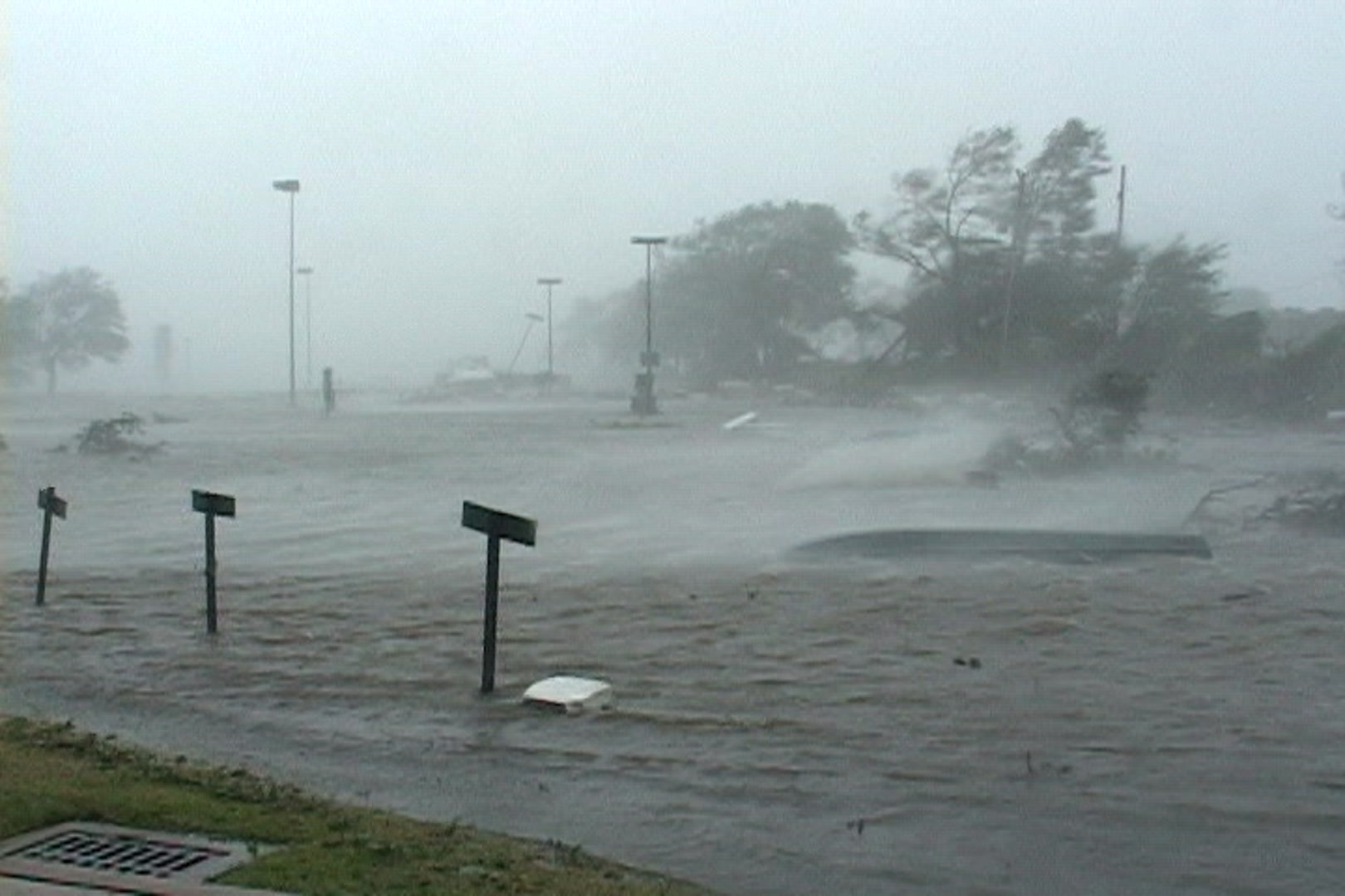 Small boat and other debris float inland just as Katrina arrives
