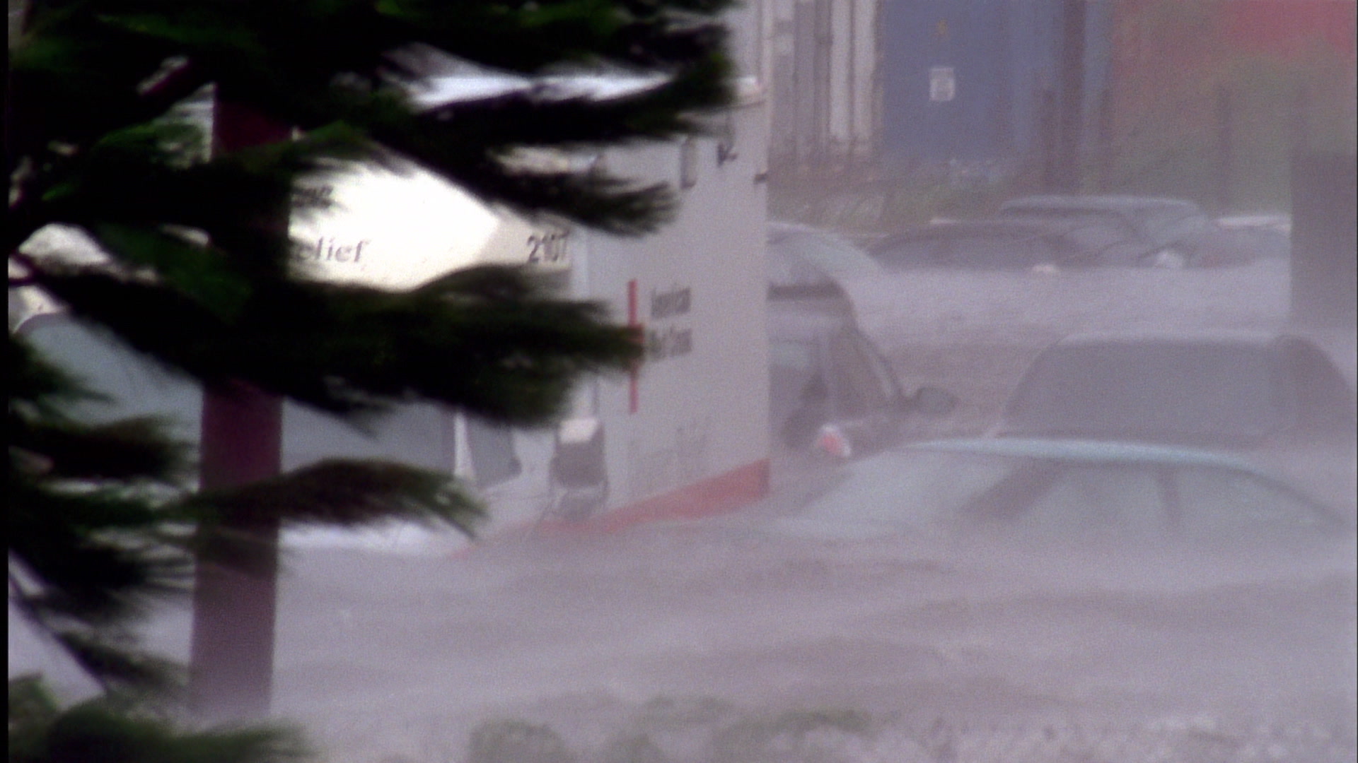 Intense winds shake camera, cars and Red Cross truck caught in storm surge, Hurricane Katrina, film