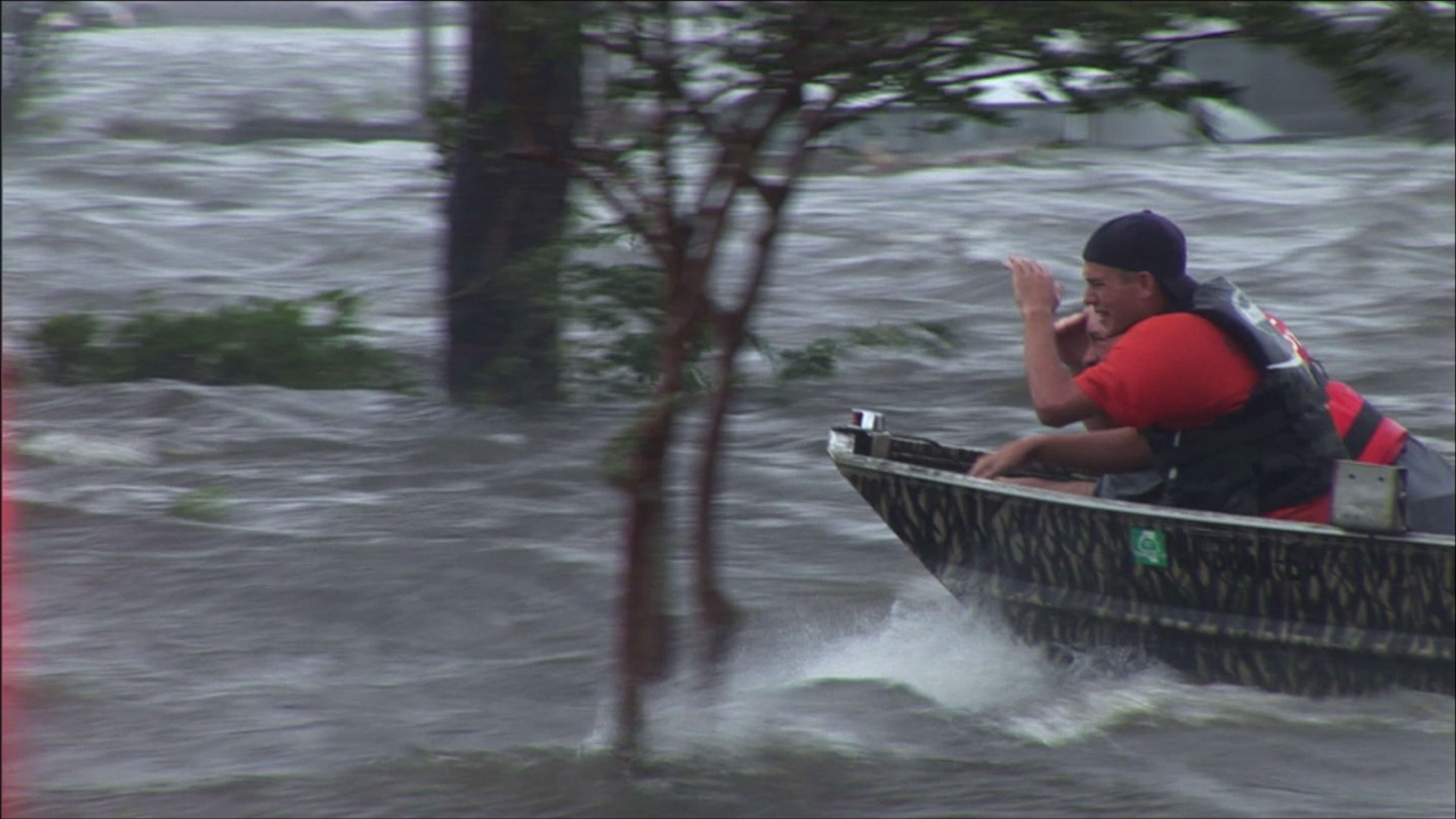 Searching for victims in flooded parking lot, high water rescue team, Hurricane Katrina, 4K