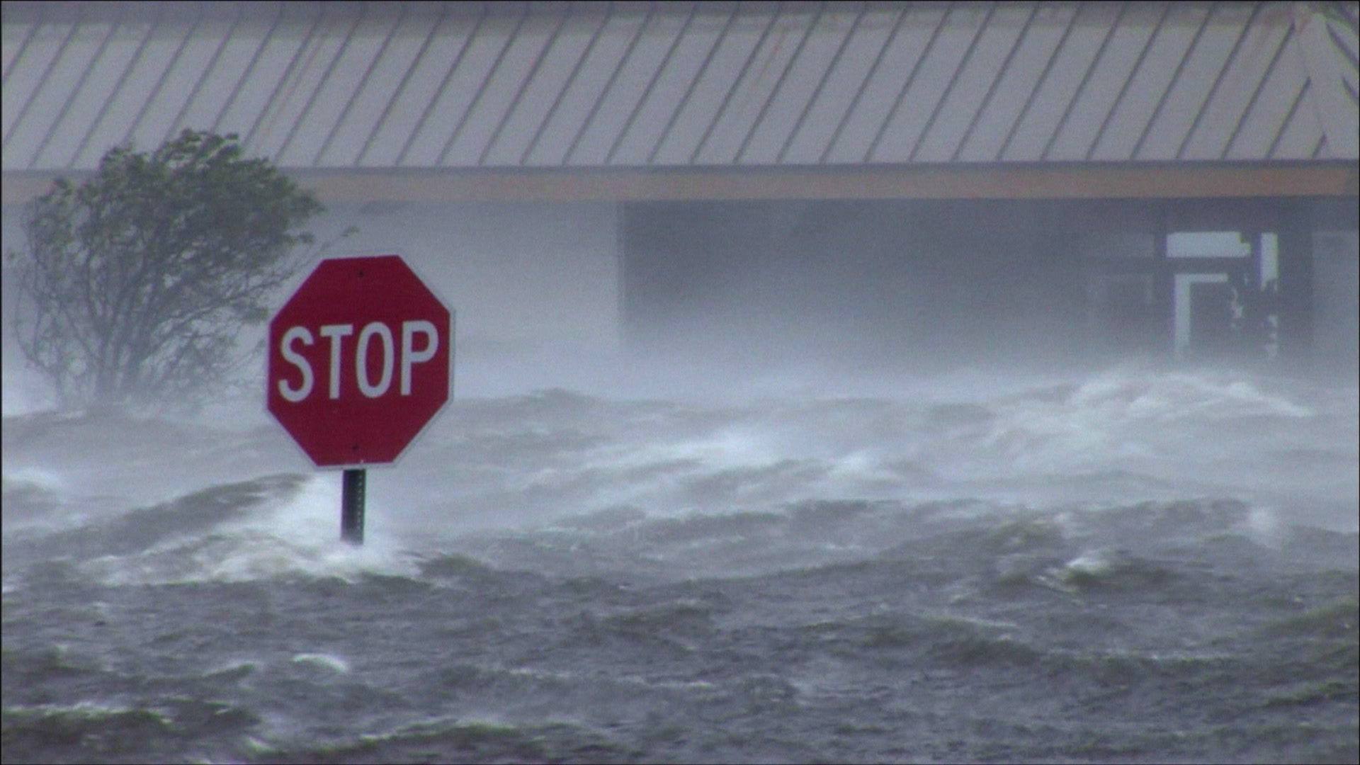 Intense, record storm surge pounds parking lot, Hurricane Katrina, Super 35mm film to 4K