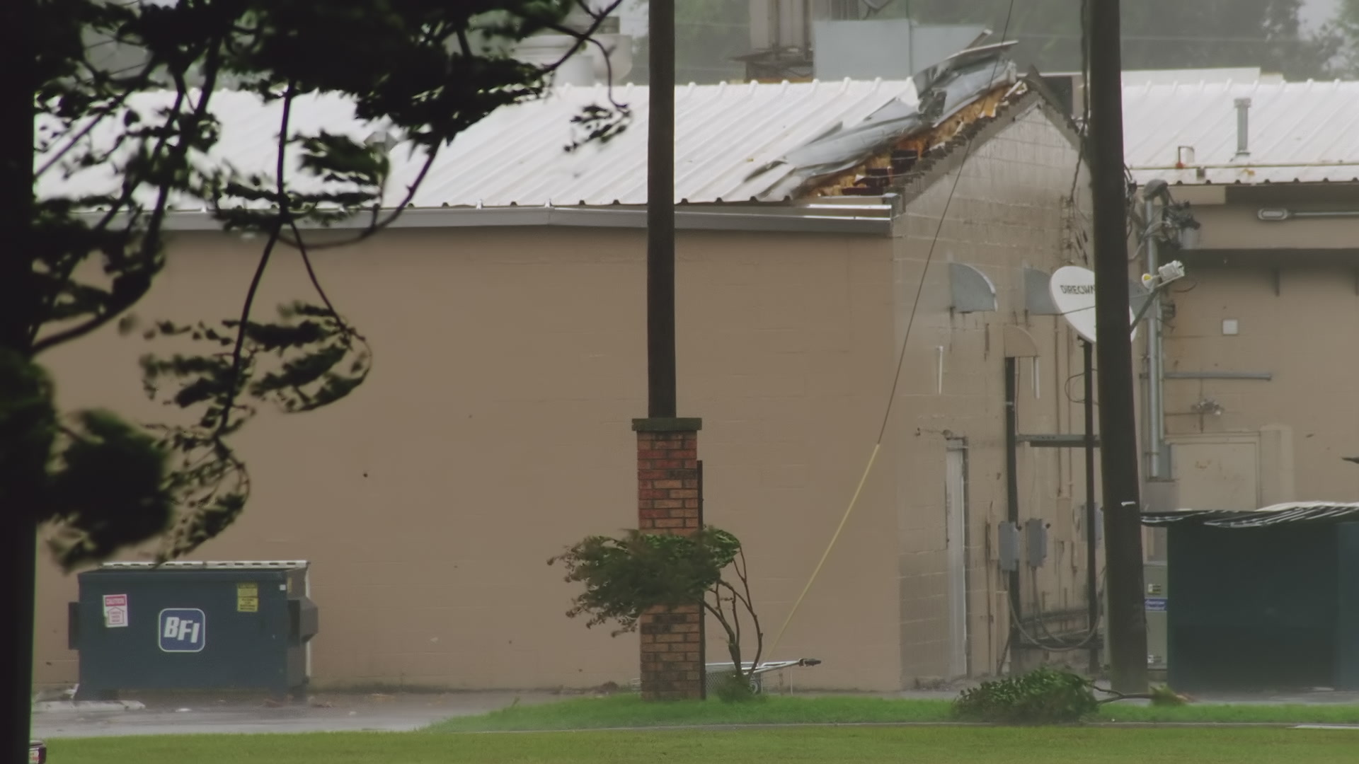 Hurricane Katrina winds peel roof away from building, Super 35mm film to 4K video