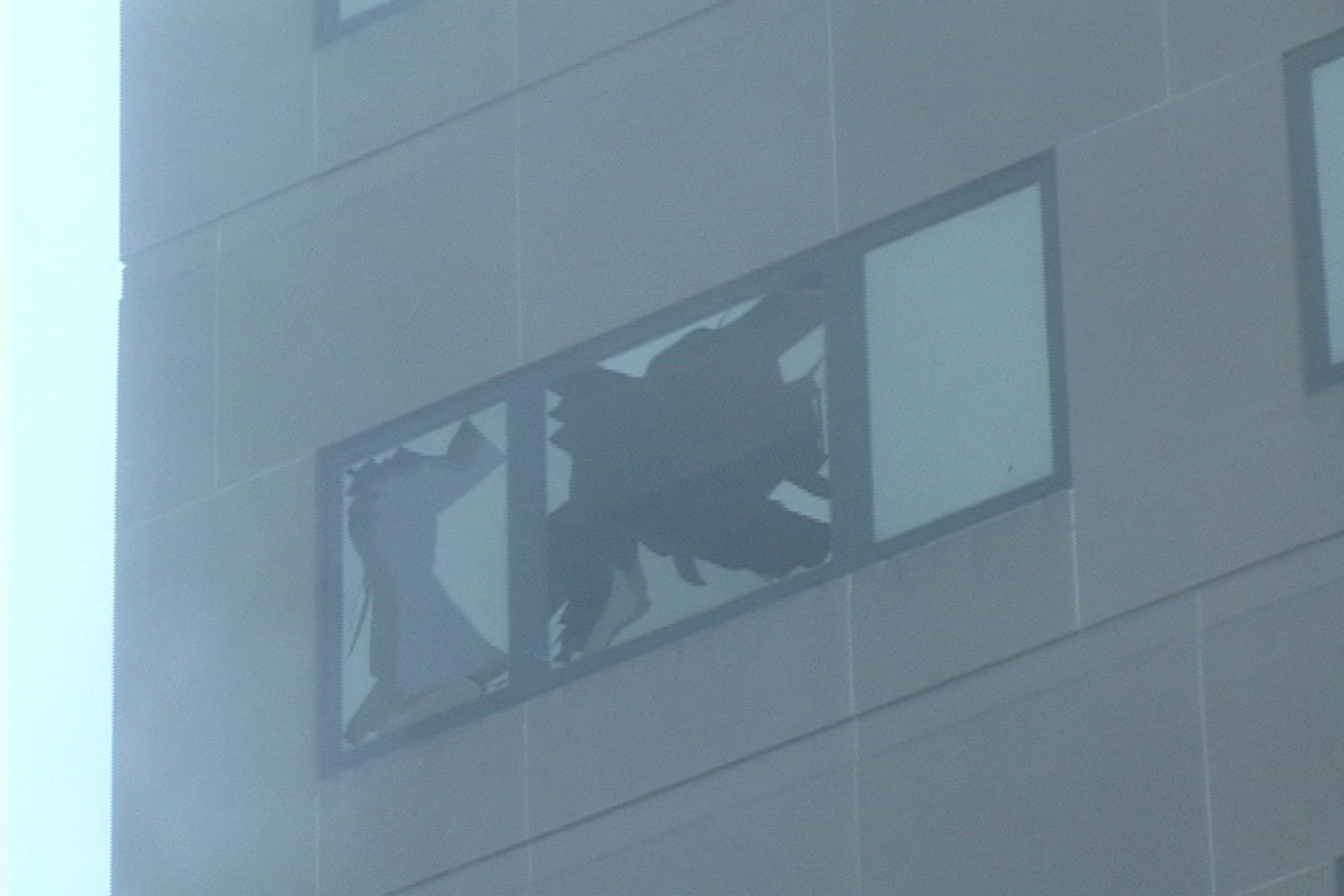 Close-up of blown out bank building window during Hurricane Katrina