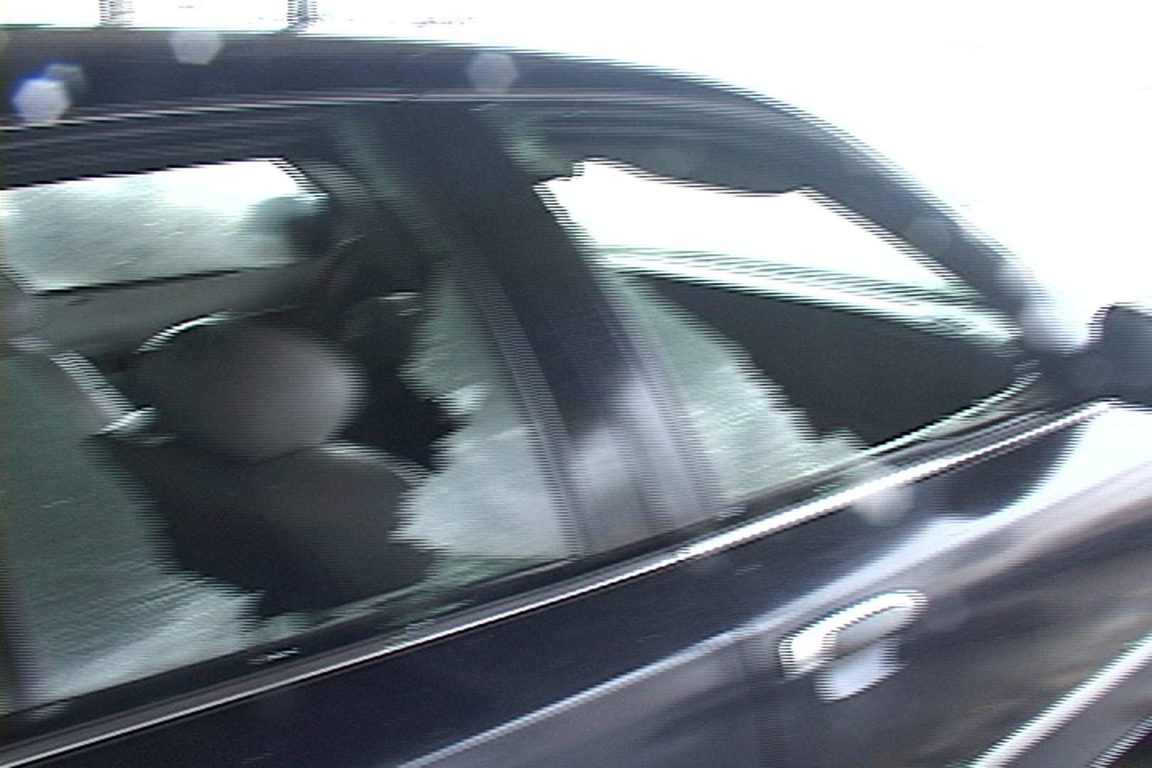 Car windows blown out after Hurricane Katrina