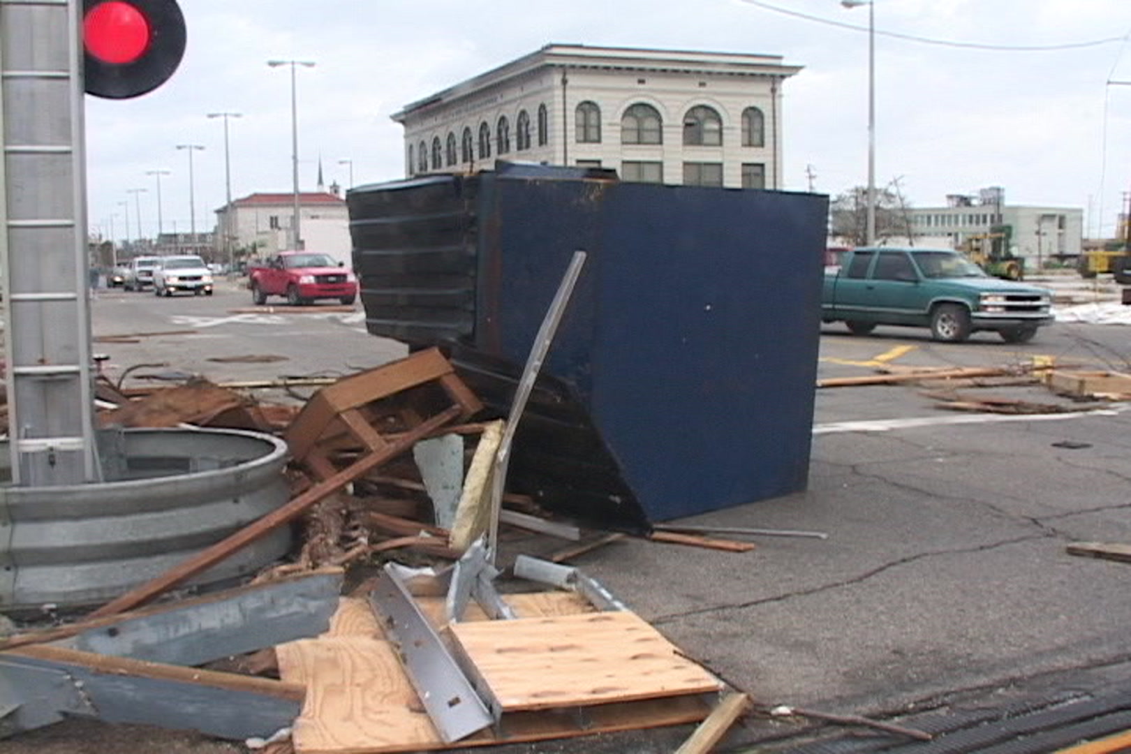 Pan shot of debris scattered on street after Hurricane Katrina
