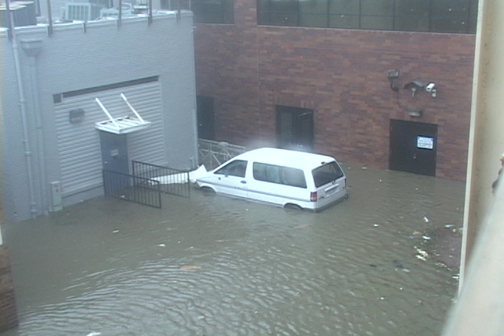 Zoom into flooded van, Hurricane Katrina