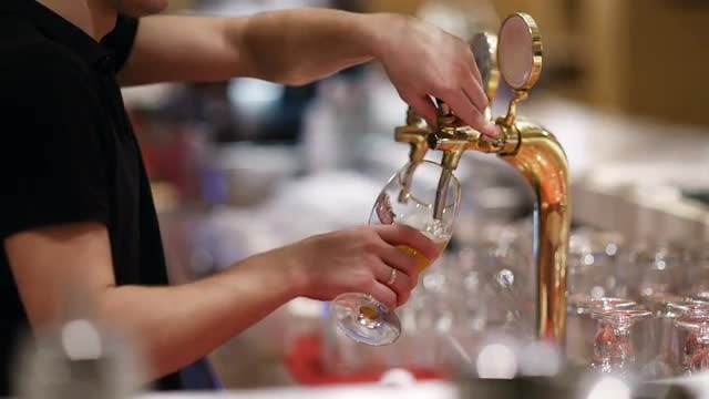 Draft beer pouring