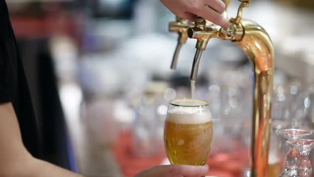 Draft beer pouring
