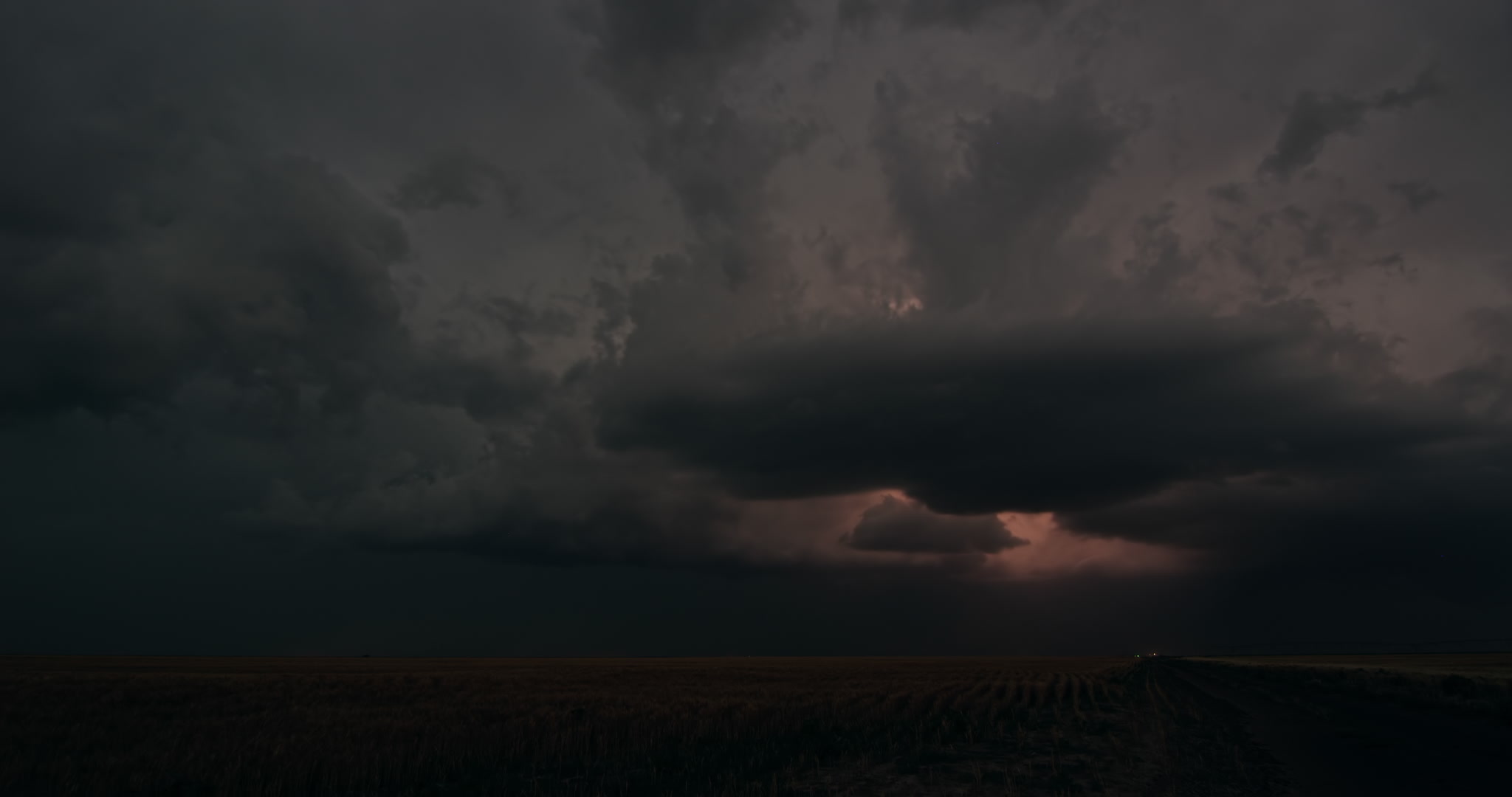 Lightning storm over wheat field, dusk, Nebraska, 4K