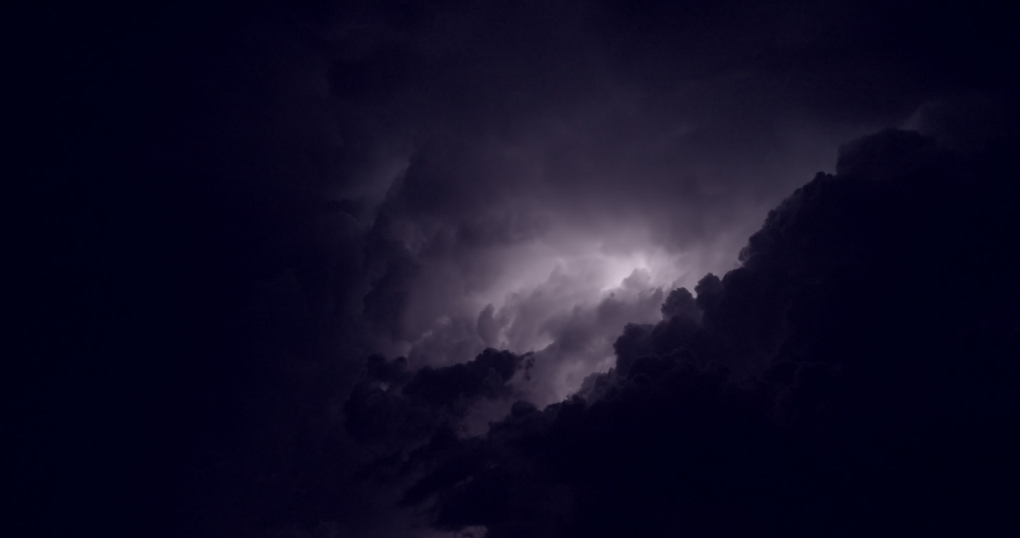 Big flashes of lightning, top of severe storm, night, 4K