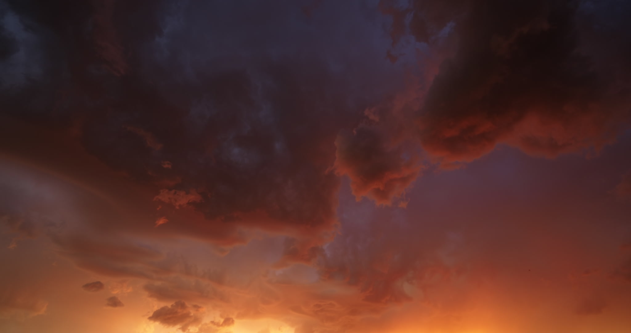 Time-lapsed, beautiful orange, stormy sky with lightning, 4K