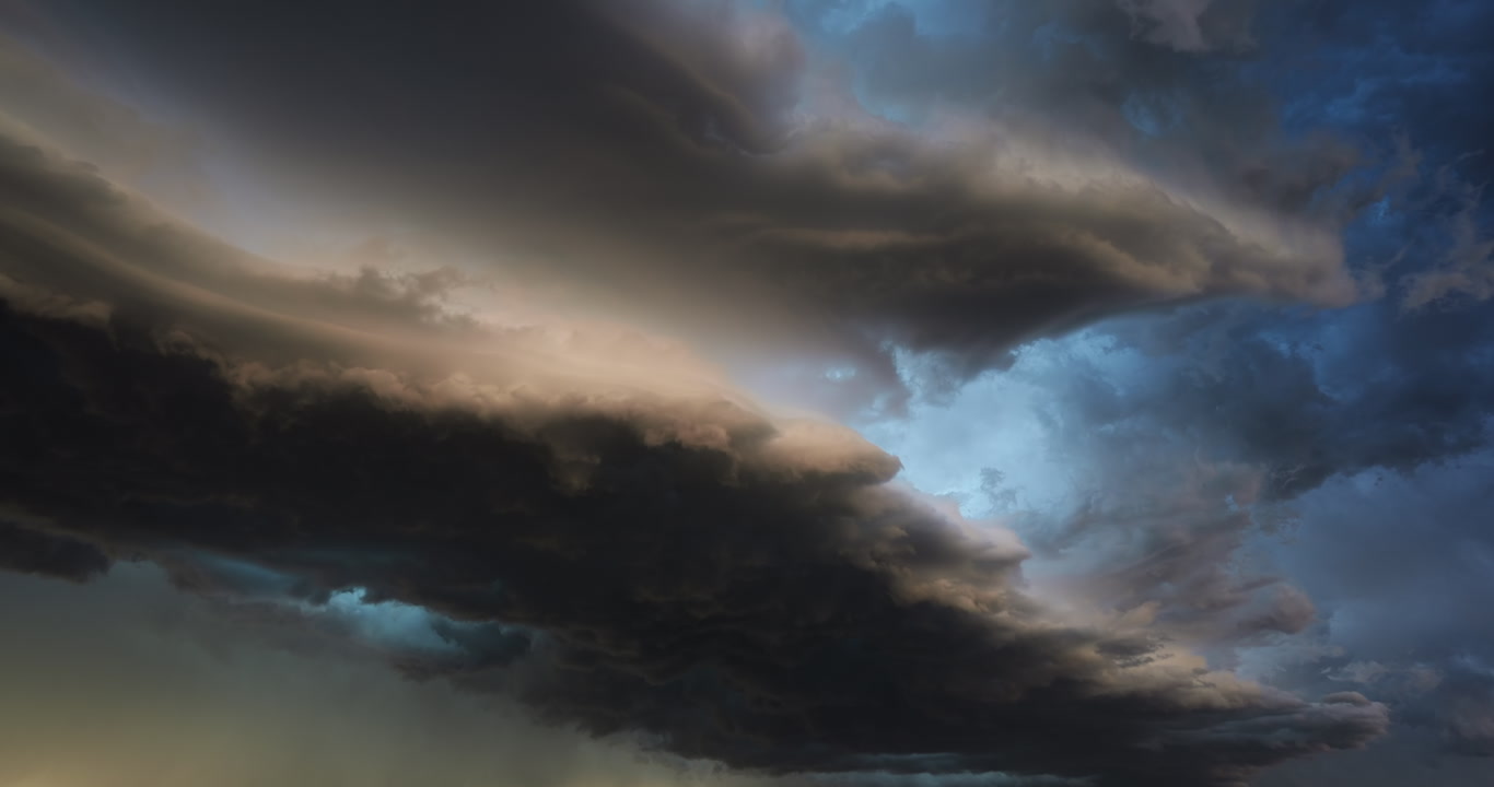Alien-like teal and orange seven storm approaches, lightning, 4K, slow time-lapse