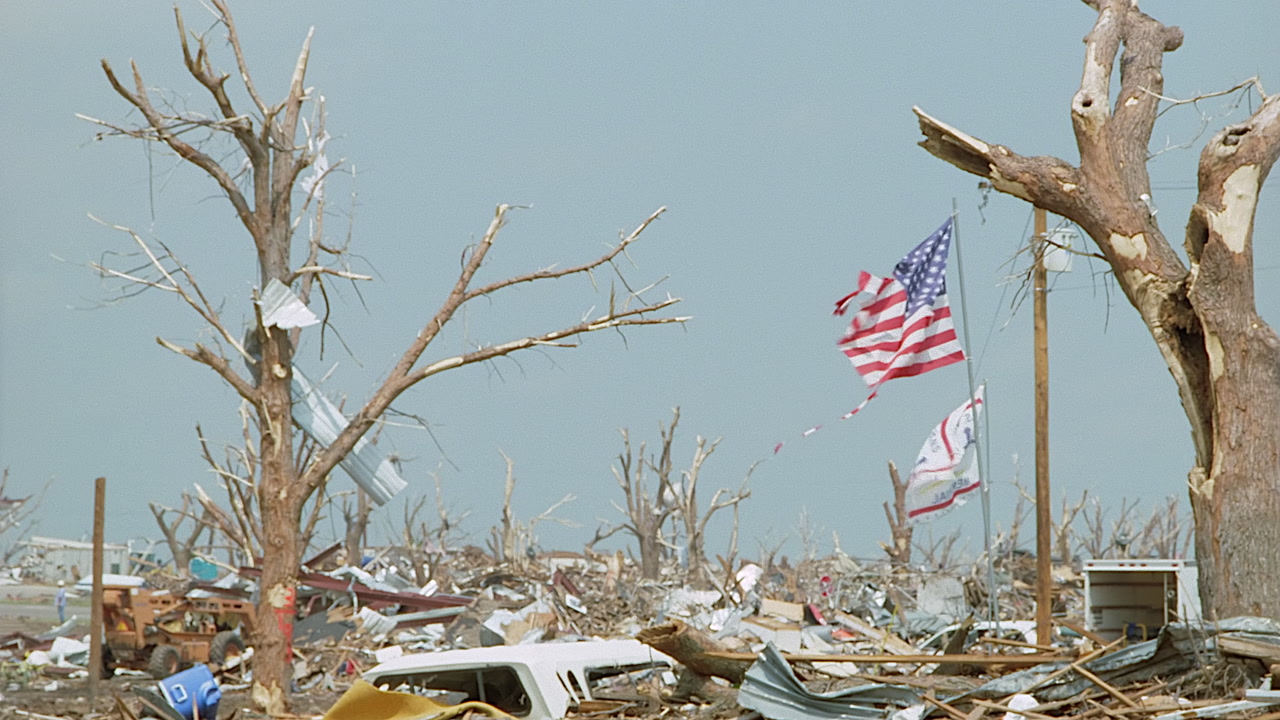 Tornado damage and aftermath - American flag flies over destruction, Greensburg EF5 aftermath, 35mm film to 4K