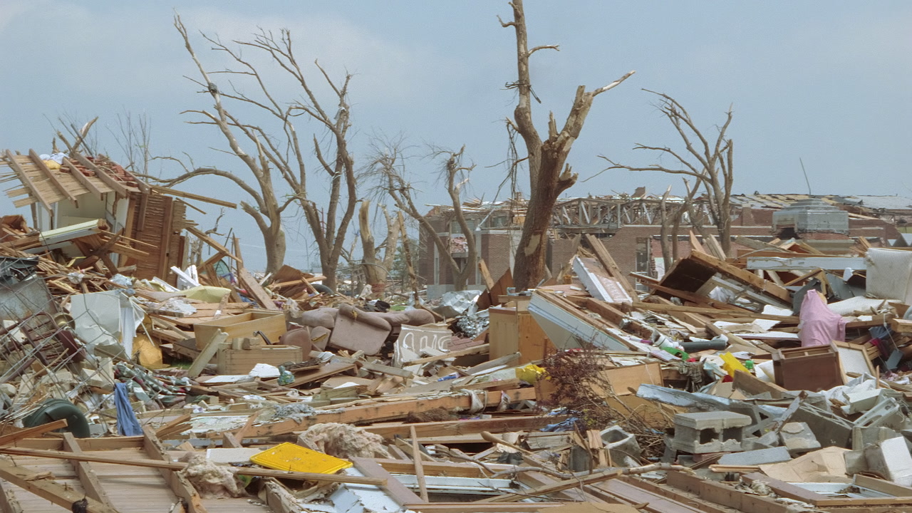 Tornado damage and aftermath - pan right, close-up of debris, Greensburg EF5 aftermath, 35mm film to 4K