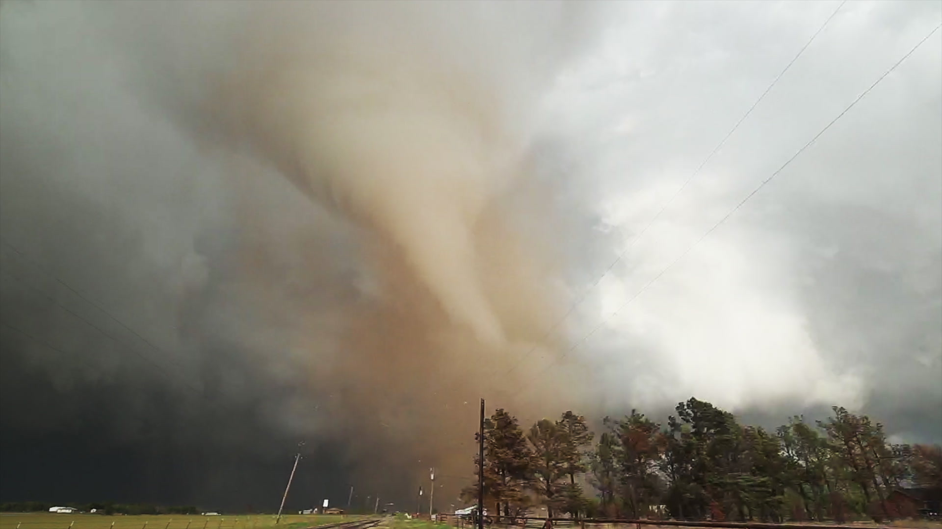Red tornado and storm chaser, rural highway, Lockett, Texas, 4K