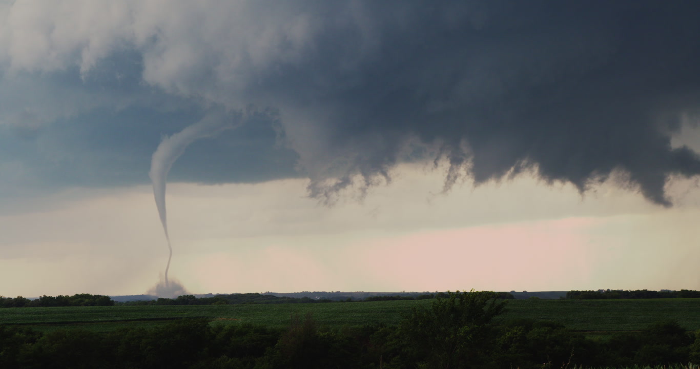 Snake-like tornado over green corn, Iowa, 4K