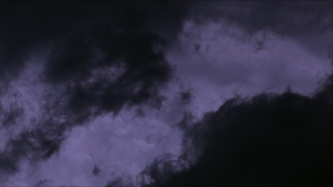 Inky black storm clouds swirl, forked lightning bolts flash, night - Super 35mm film to HD 1080