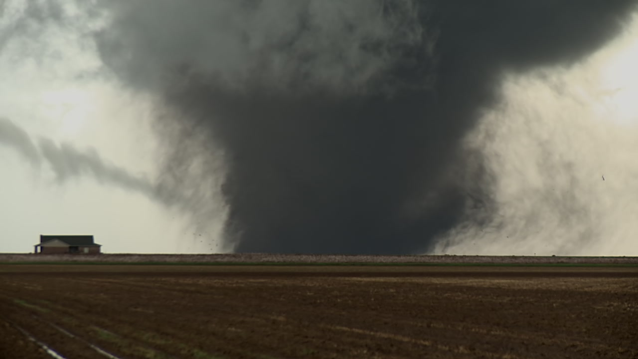 Large, wedge shaped tornado with big lightning strike - HD 1080