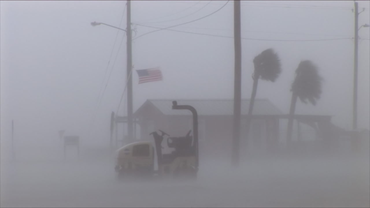 Intense winds, rain, tractor, bait shop and flag - Hurricane Gustav, Mississippi, HD 1080