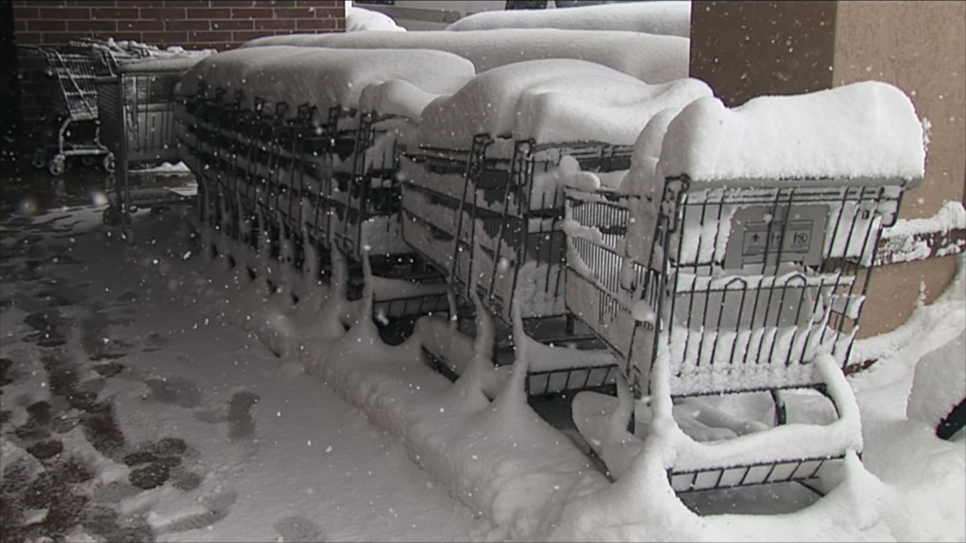 Snow covered grocery shopping carts - winter storm, HD 1080