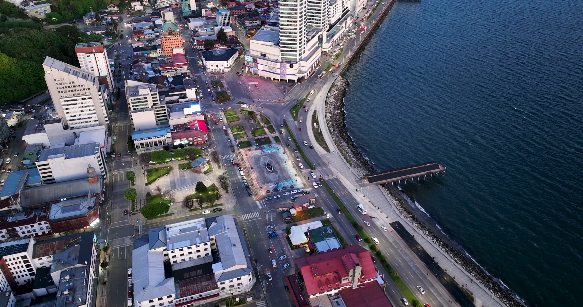 Aerial Tilt Up and Dolly Forward City Reveal