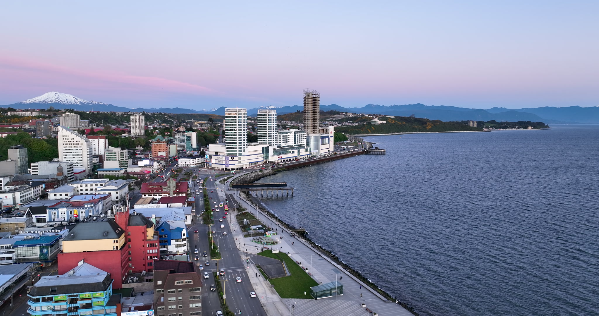 Cinematic Blue Hour Aerial View of Coastal City