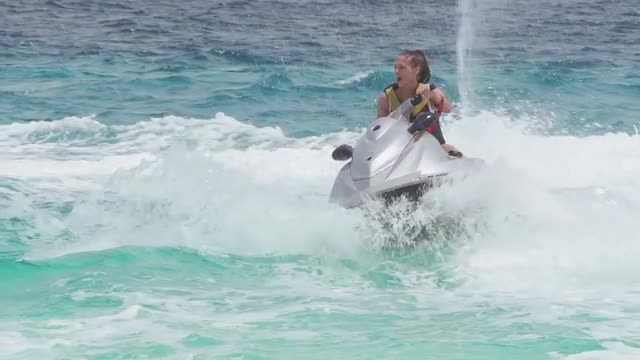 Speeding And Splashing On Jet Skis