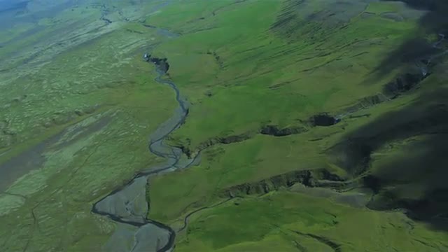 Aerial View of Fertile Plains &amp; Active Eyjafjallajokull, Iceland