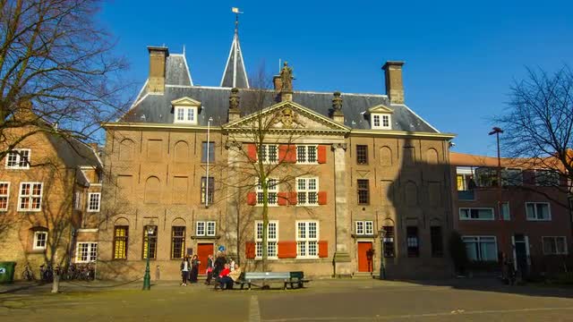 Old majestic building in the town of Leiden, Holland, The Netherlands, 4k hyperlapse on a beautiful 
