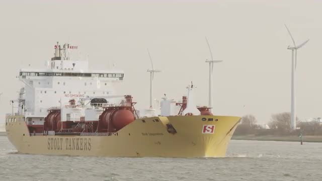 A ship leaving the port of Rotterdam.
