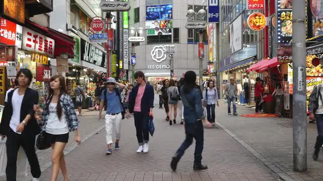 Pan Down - Busy Shibuya Shopping District Daytime  - Shibuya, Tokyo Japan
