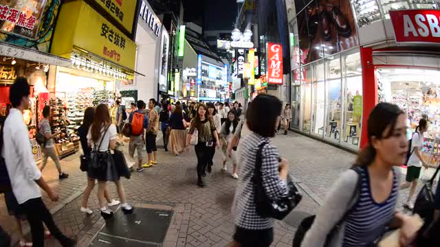 Busy Shinjuku Entertainment / Shopping District at Night - Tokyo Japan