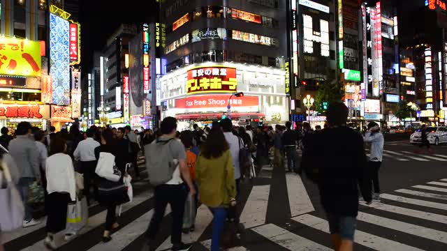 Busy Shinjuku Entertainment / Shopping District at Night - Tokyo Japan