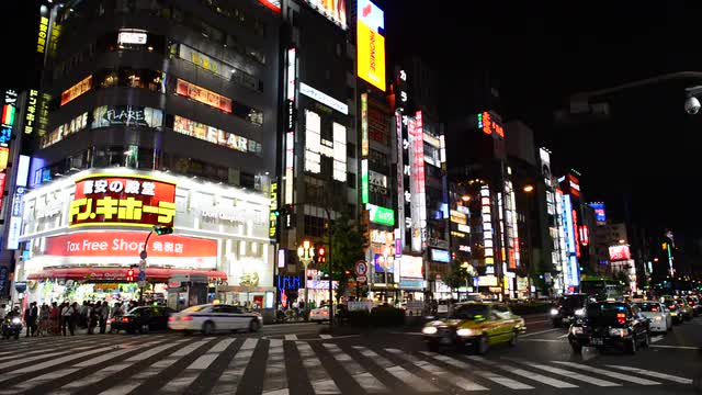 Busy Shinjuku Entertainment / Shopping District at Night - Tokyo Japan