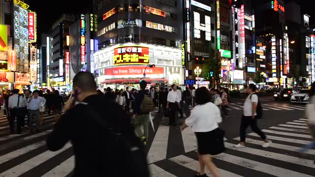 Busy Shinjuku Entertainment / Shopping District at Night - Tokyo Japan