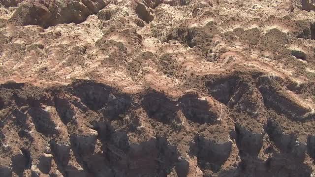 Aerial Shot of Desert Mountains &amp; Spines