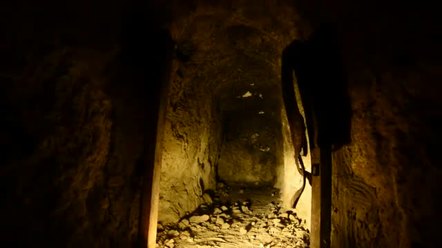 Dolly Pan of Abandon Gold Silver Mine at Night 