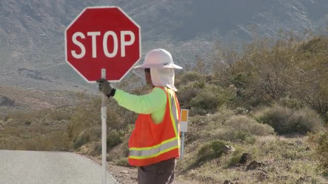 Construction Worker with stop sign
