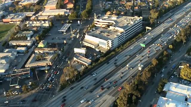 Aerial View of Los Angeles Freeway / Highway / Suburbs - Clip 6