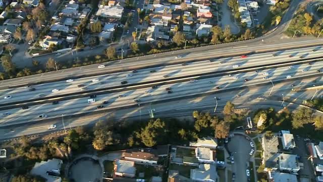 Aerial View of Los Angeles Freeway / Highway / Suburbs - Clip 11