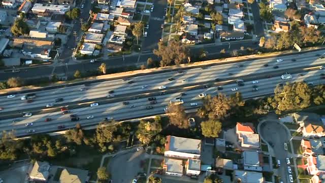 Aerial View of Los Angeles Freeway / Highway / Suburbs - Clip 10