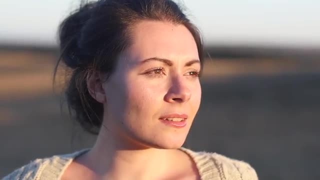 Woman Looking Out Into The Sun #2